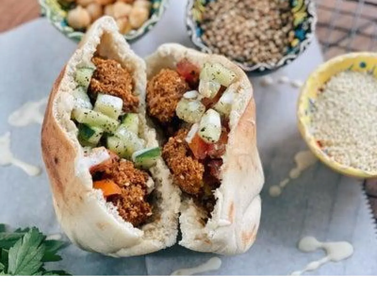 Falafel Sandwich w/ beets & apple salad Falafel Sandwich w/ beets & apple salad