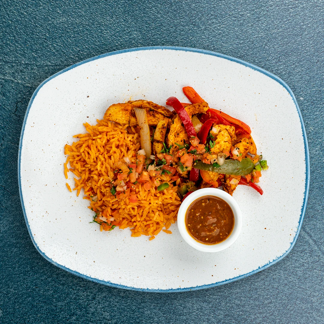 Chicken Fajitas with Spanish Rice, Refried Beans, and Corn Tortillas Chicken Fajitas with Spanish Rice, Refried Beans, and Corn Tortillas