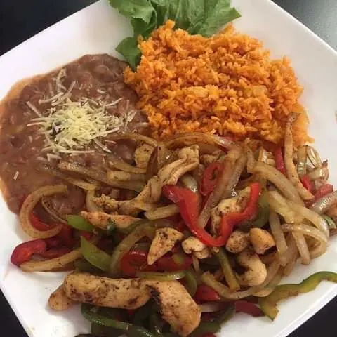 Chicken Fajitas with Spanish Rice, Refried Beans, and Flour Tortillas Chicken Fajitas with Spanish Rice, Refried Beans, and Flour Tortillas