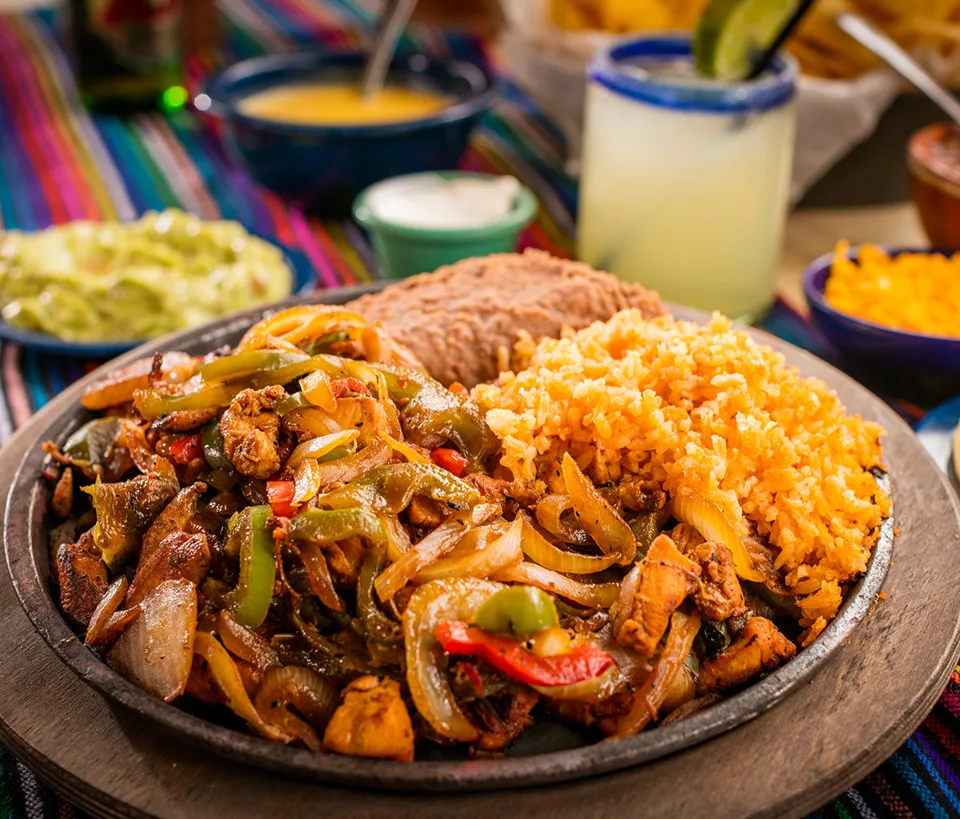 Tofu Fajitas with Spanish Rice, Refried Beans, and Flour Tortillas Tofu Fajitas with Spanish Rice, Refried Beans, and Flour Tortillas