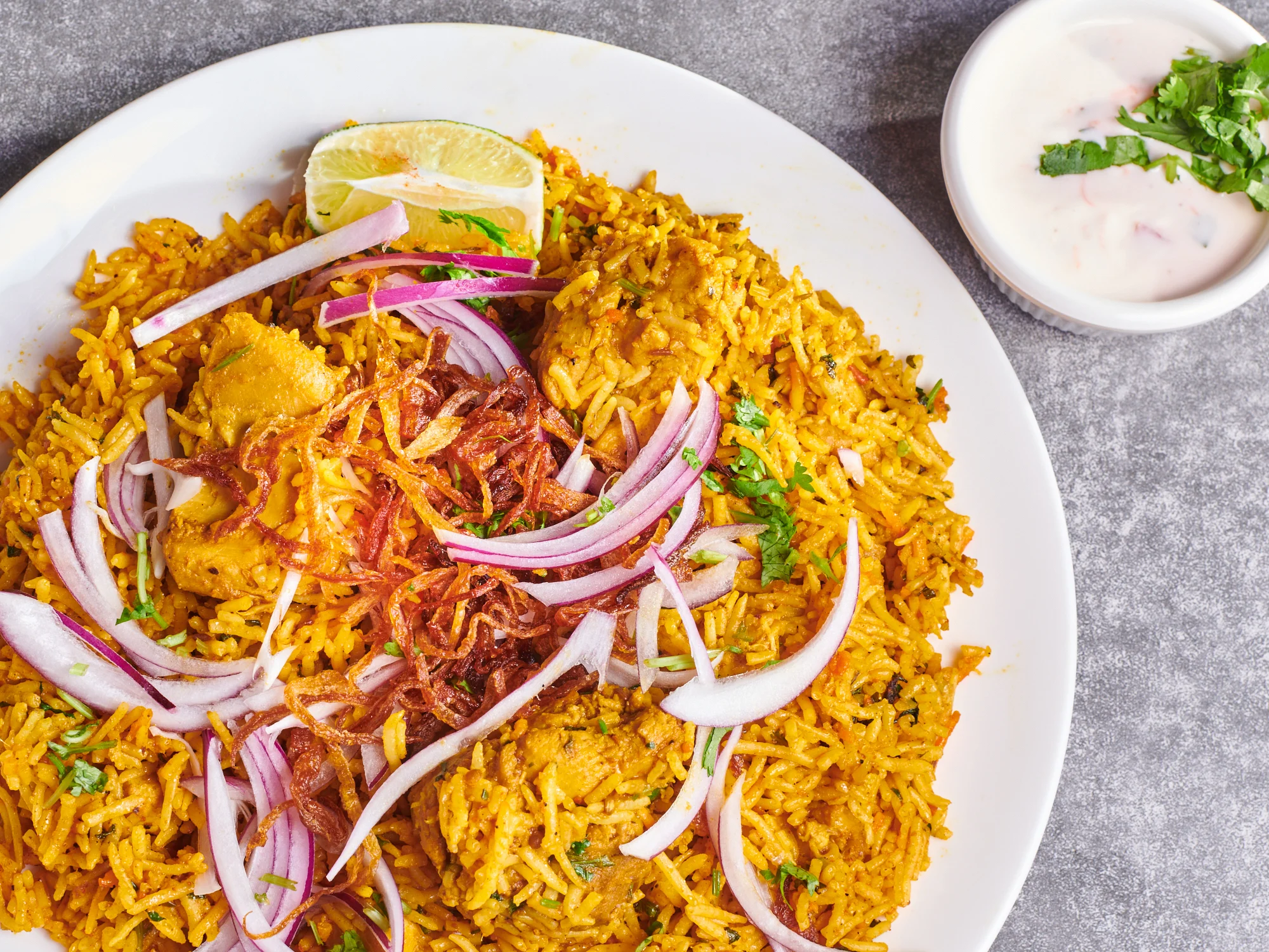 Chicken Biryani with Vegan Samosa Chicken Biryani with Vegan Samosa