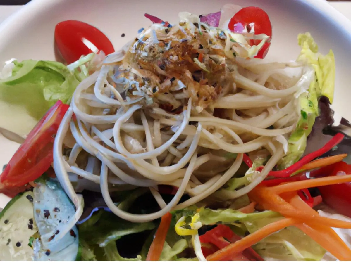 Vegetable and noodle salad with wasabi soy dressing in individual takeout cups Vegetable and noodle salad with wasabi soy dressing in individual takeout cups