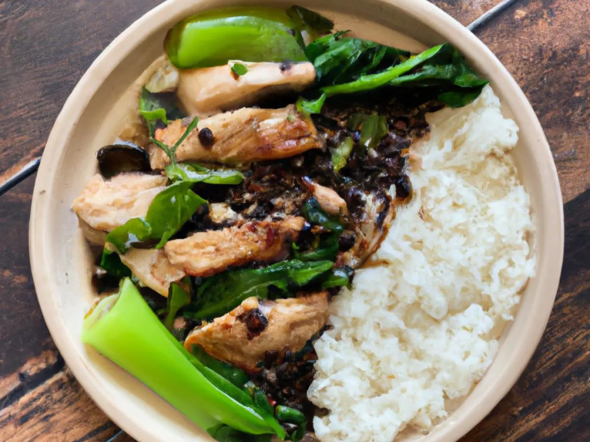 Braised chicken in black bean sauce with steamed rice and bok choy Braised chicken in black bean sauce with steamed rice and bok choy