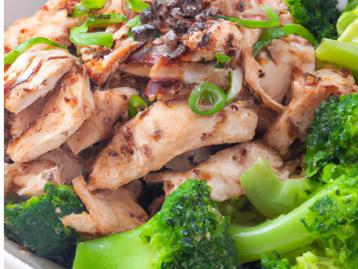 Garlic Chicken Bulgogi Boxed Lunch Over Mixed Greens with Sesame Ginger Dressing Garlic Chicken Bulgogi Boxed Lunch Over Mixed Greens with Sesame Ginger Dressing