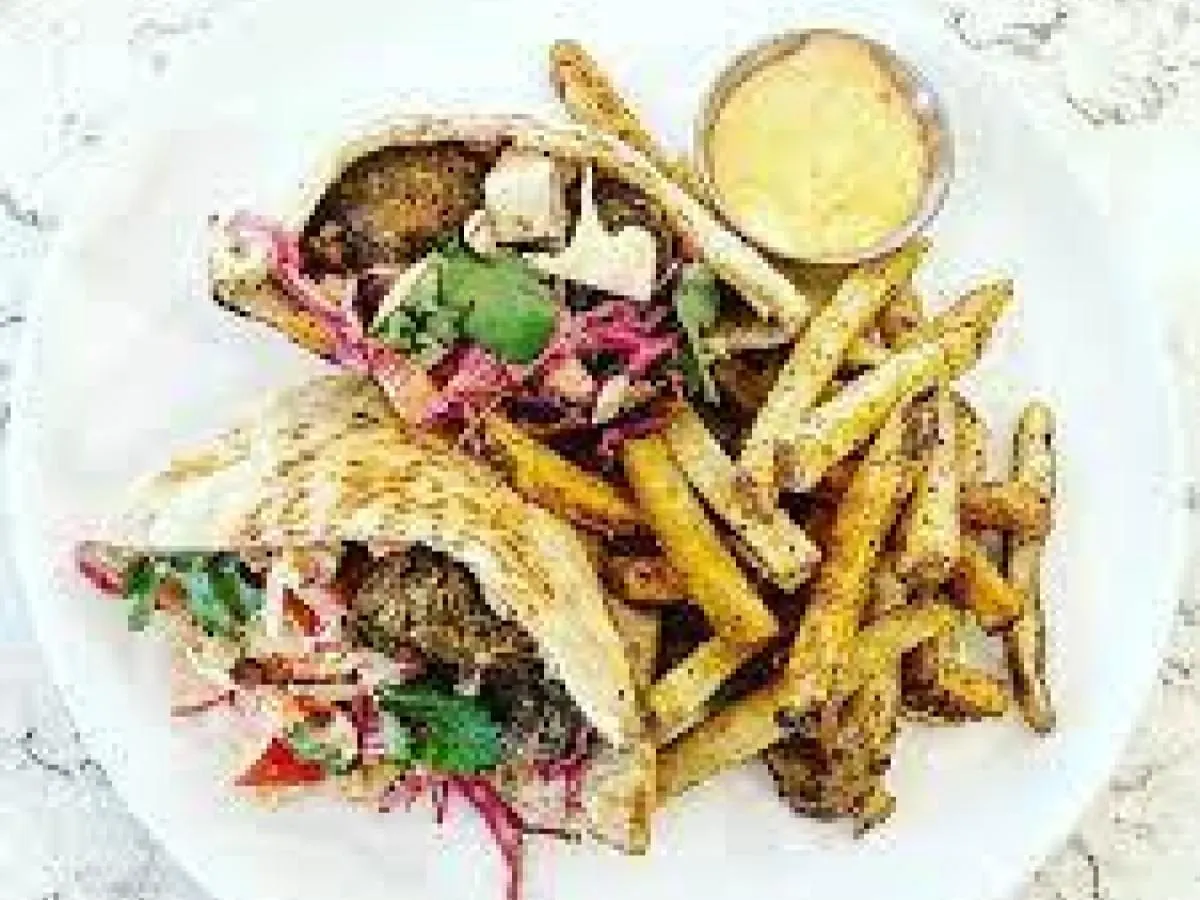 Vegan Falafel Pita Sandwich & Sidewinder Fries Vegan Falafel Pita Sandwich & Sidewinder Fries