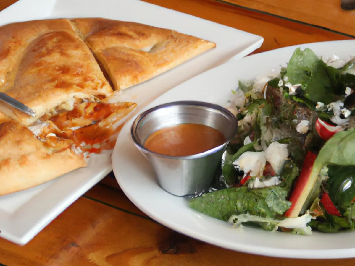 Half Veggie Calzone and Salad Half Veggie Calzone and Salad
