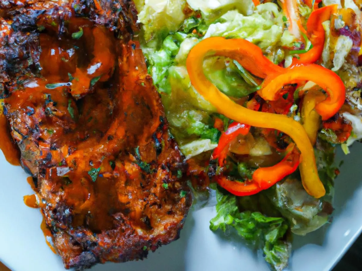 Jerk Pork with Steamed Cabbage and Garden Salad Jerk Pork with Steamed Cabbage and Garden Salad