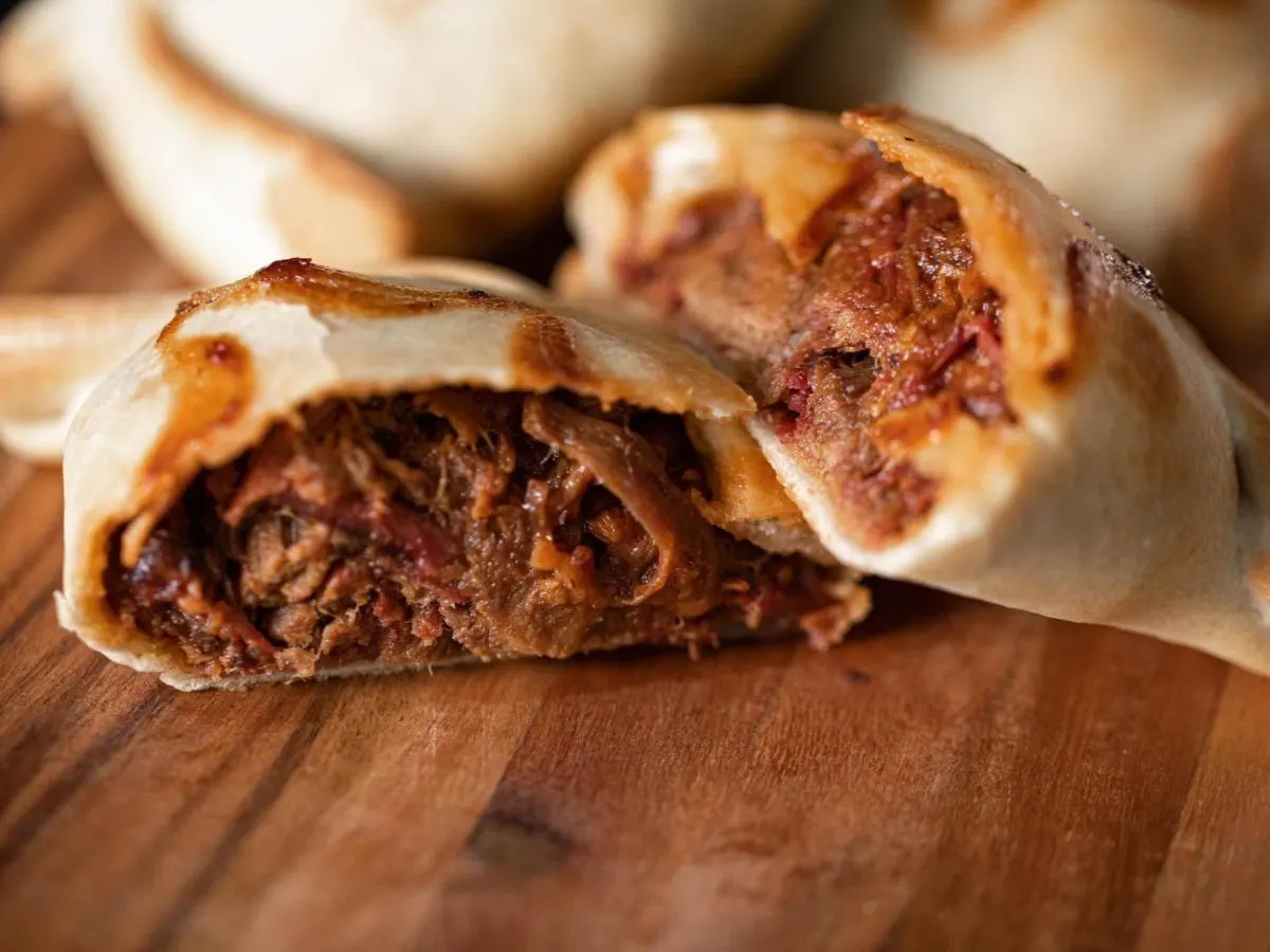 Come y Calla Empanada
