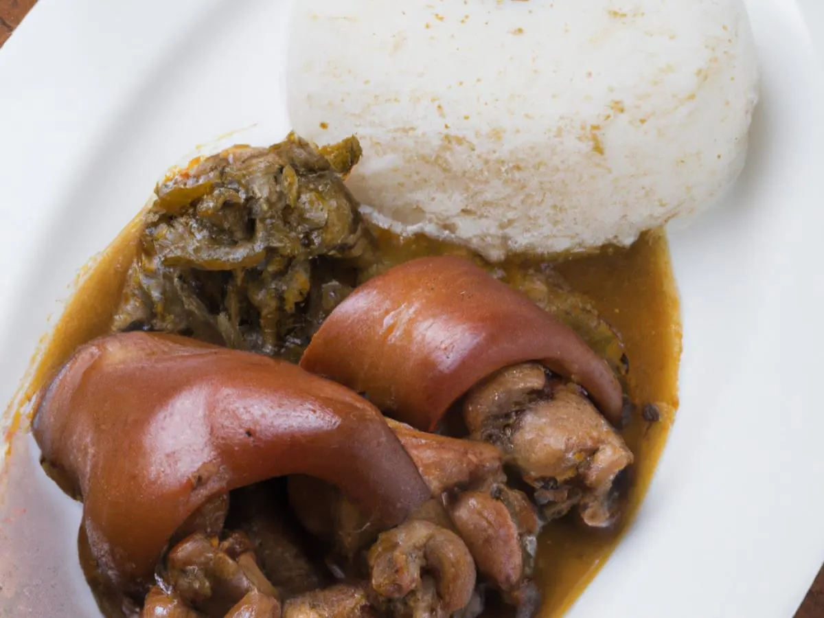 Marinated Pig Feet & Pig's Intestine in Brown Sauce served with White Rice Marinated Pig Feet & Pig's Intestine in Brown Sauce served with White Rice