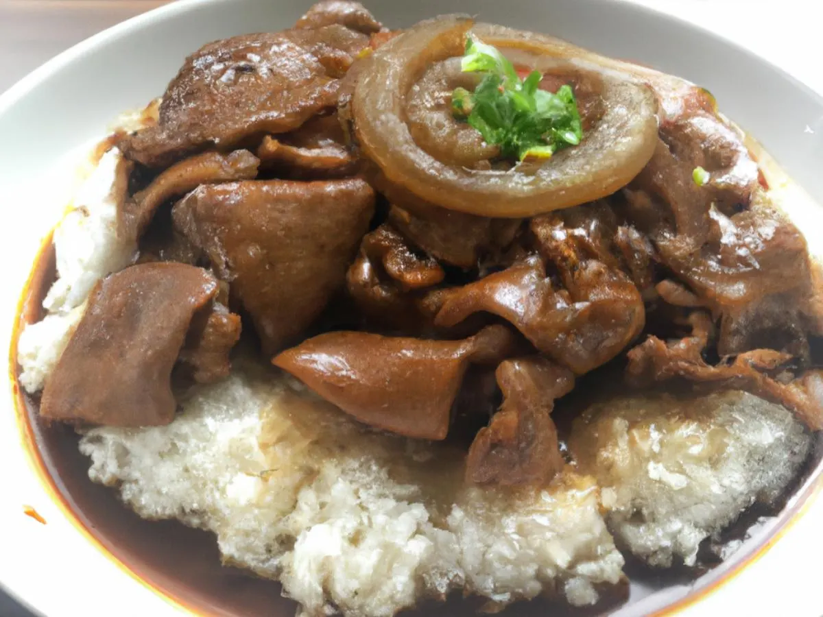Beef With Scallions & Pig's Intestine in Brown Sauce served with White Rice Beef With Scallions & Pig's Intestine in Brown Sauce served with White Rice