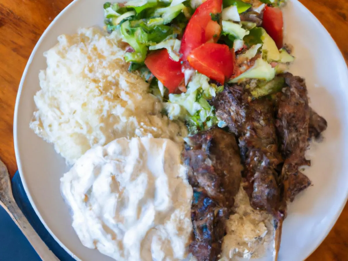 Lamb Kebab Plate with Rice, Tzatziki and Mediterranean Salad Lamb Kebab Plate with Rice, Tzatziki and Mediterranean Salad