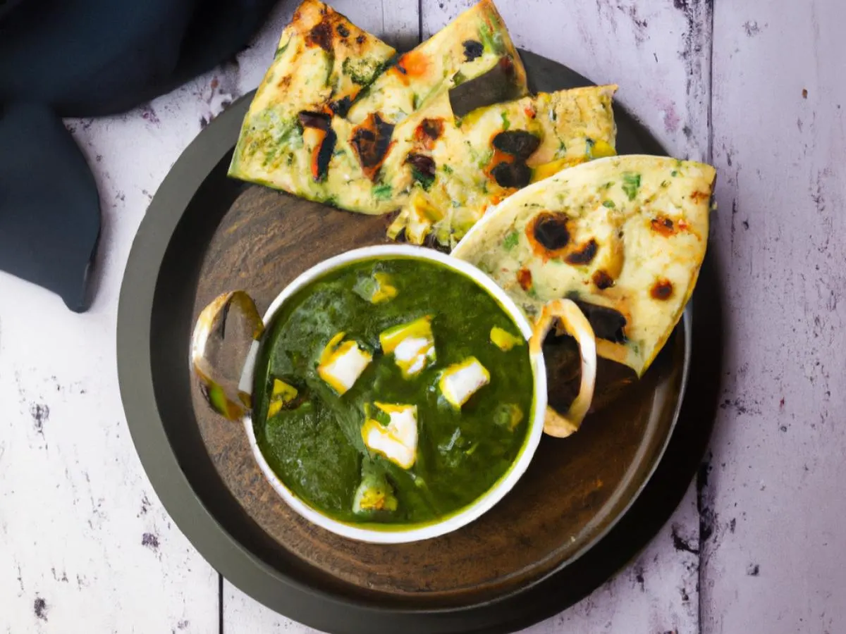 Vegetarian Palak Paneer served with Garlic Naan and Mixed Veggies Vegetarian Palak Paneer served with Garlic Naan and Mixed Veggies
