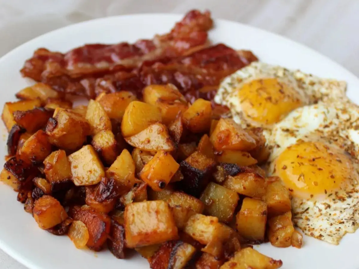 Eggs and Bacon Box with Fruits and Fries