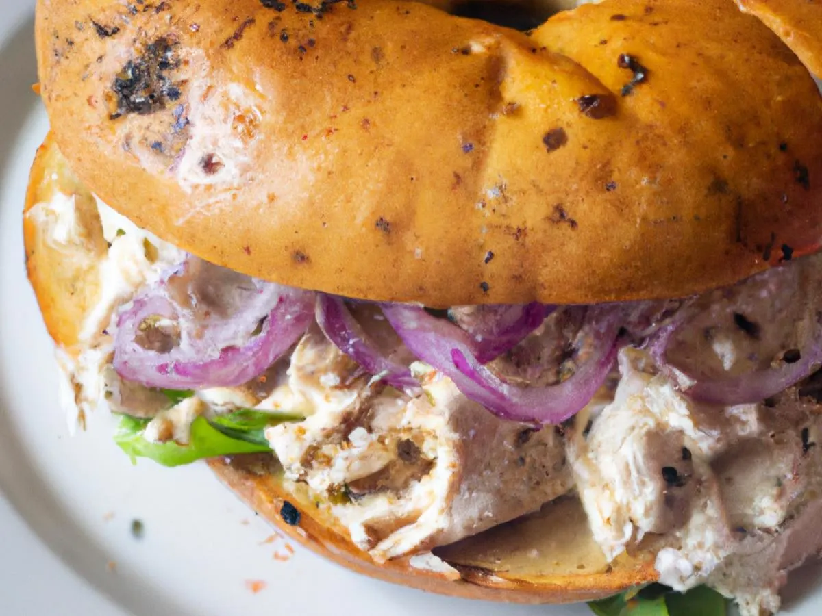 Plain Bagel Saffron Chicken Shwarma Sandwich with Side Salad Plain Bagel Saffron Chicken Shwarma Sandwich with Side Salad