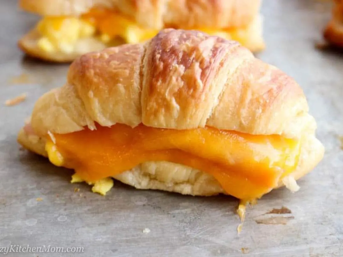 Fresh Baked Croissant with Egg & Cheddar Cheese Fresh Baked Croissant with Egg & Cheddar Cheese