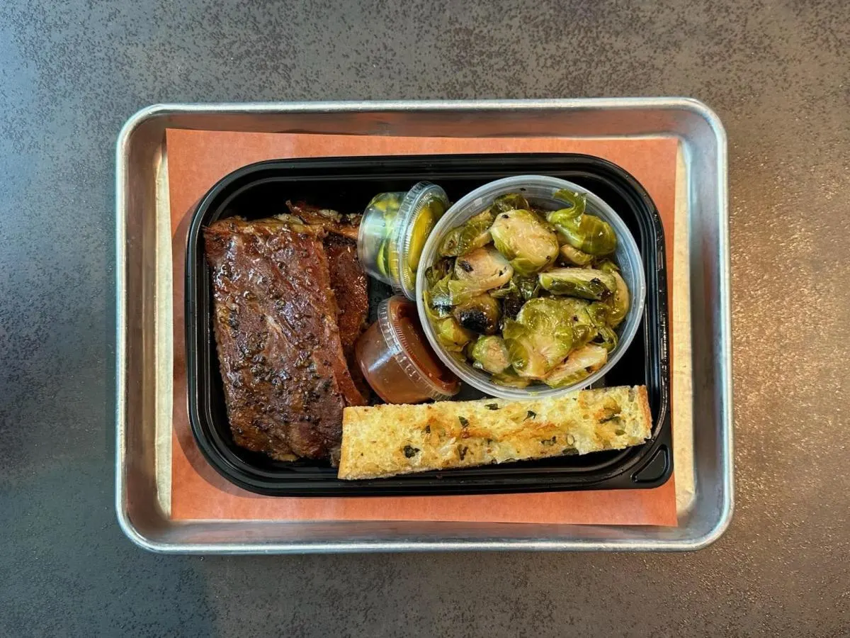 Pork Ribs With Roasted Brussel Sprouts and Garlic Bread