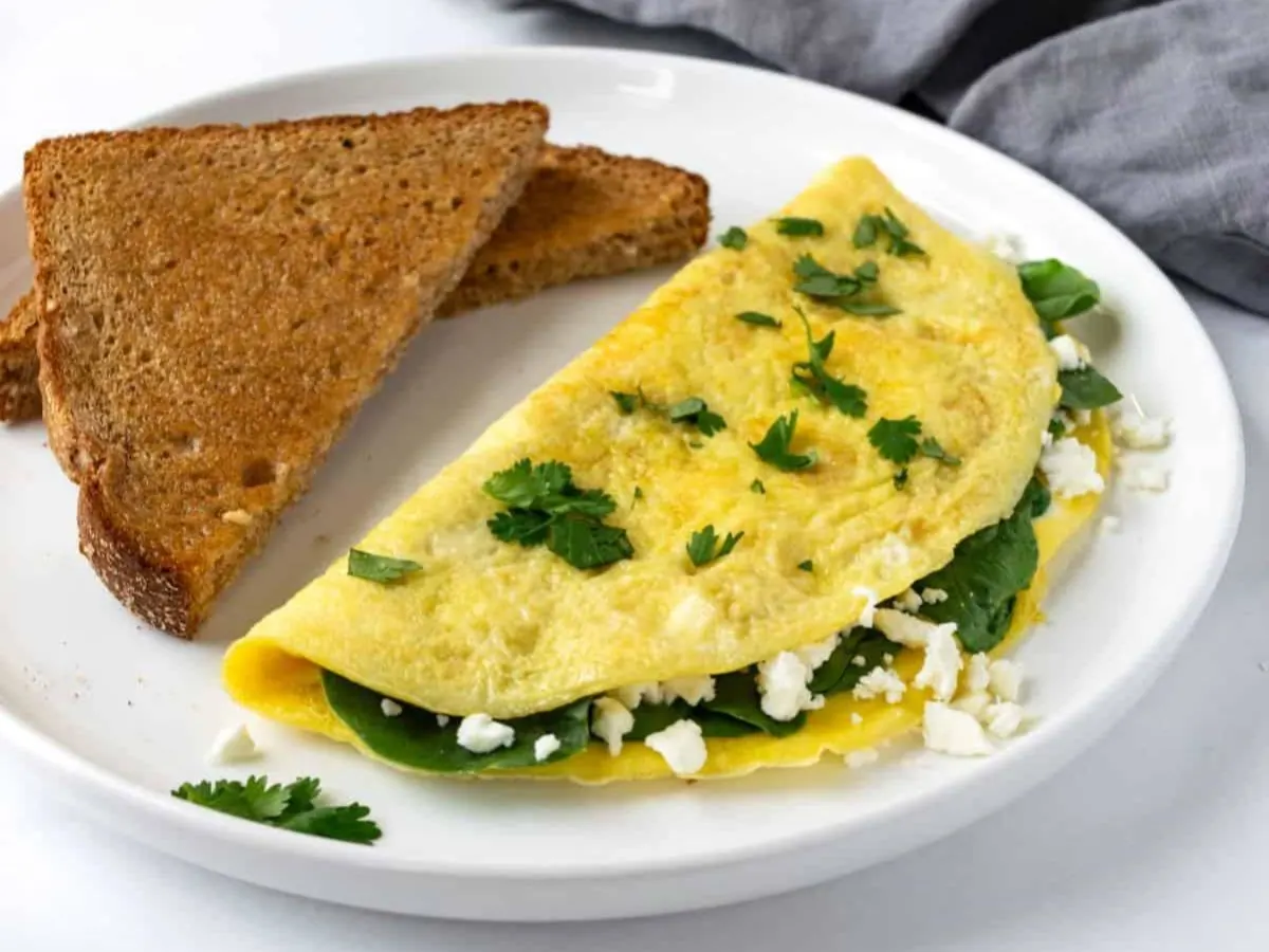 Kale, One Egg Omelette, and Cheddar Cheese Toast Kale, One Egg Omelette, and Cheddar Cheese Toast