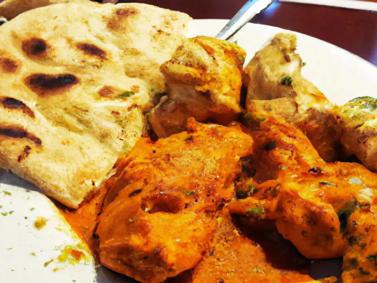 Butter Chicken Masala with Plain Naan and Vegan Samosa Butter Chicken Masala with Plain Naan and Vegan Samosa
