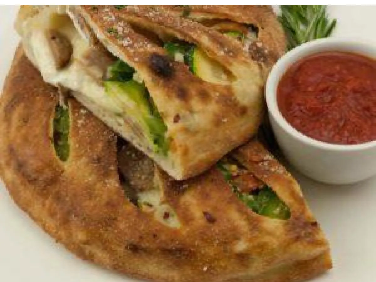 Sausage and Pepper Calzone Sausage and Pepper Calzone