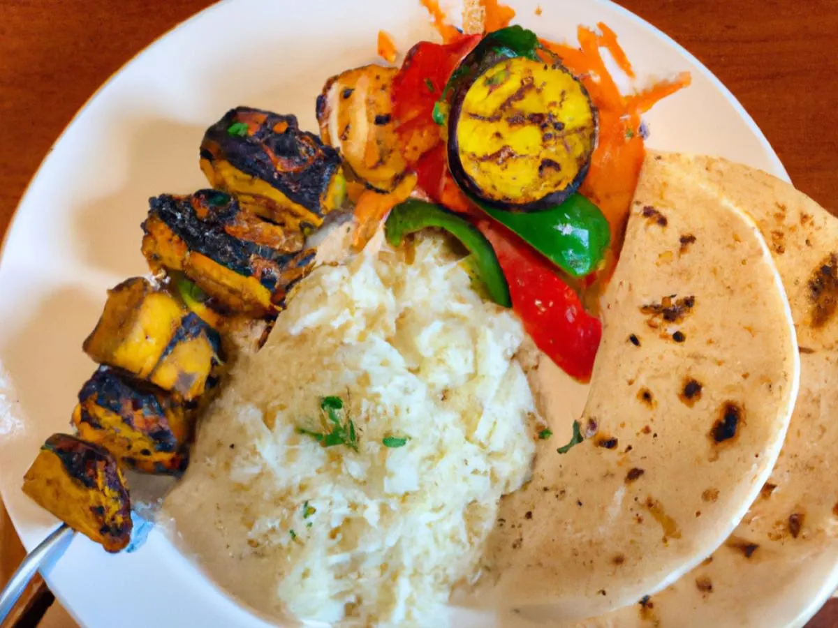 Vegan Tofu Kabab and Roasted Veggies Served With Steamed White Rice and Naan Vegan Tofu Kabab and Roasted Veggies Served With Steamed White Rice and Naan