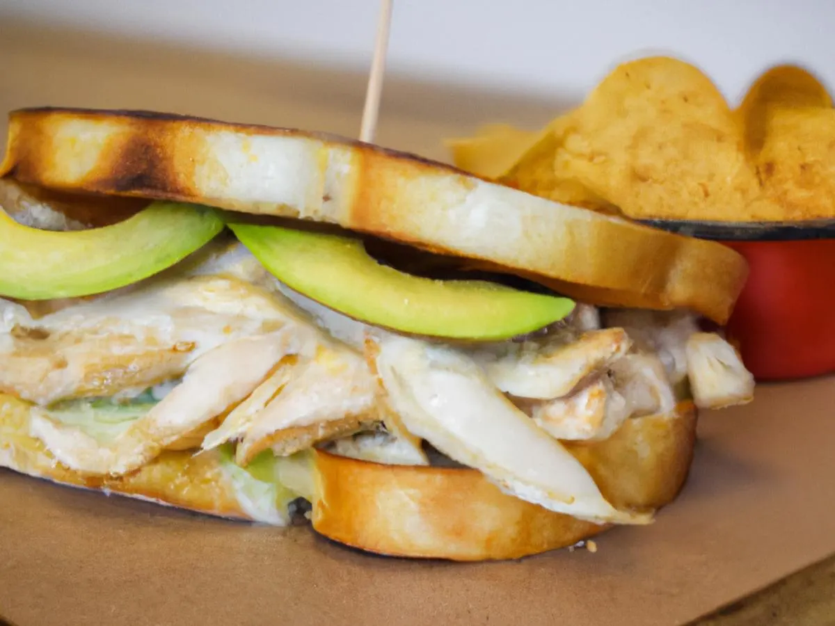 The Statue of Liberty Grilled Chicken Combo Sandwich on White with Kettle Chips The Statue of Liberty Grilled Chicken Combo Sandwich on White with Kettle Chips
