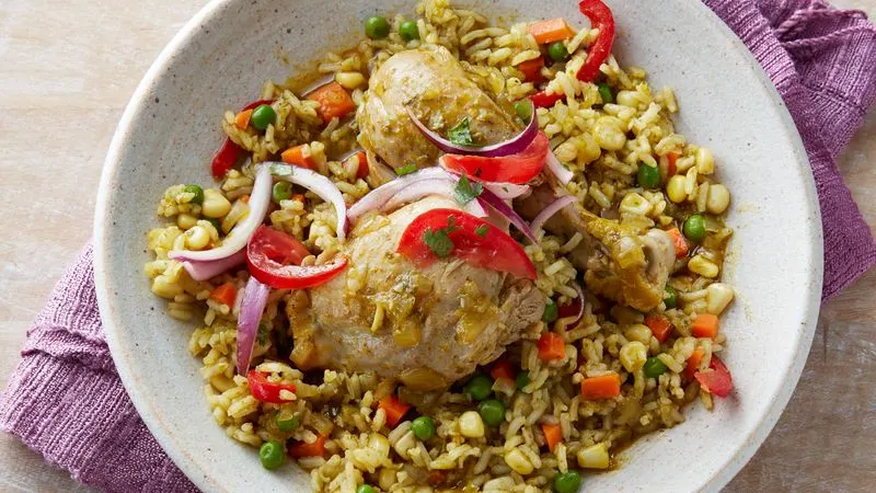 Chicken Mojo with Arroz Rojo and Sautéed Seasonal Vegetables Chicken Mojo with Arroz Rojo and Sautéed Seasonal Vegetables