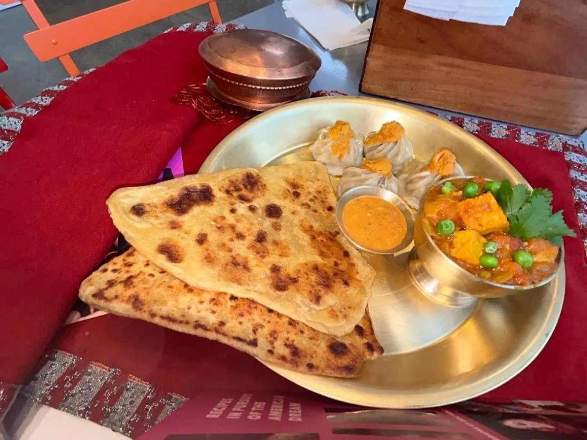 Golveda Ra Tofu Hariyo Keraw with Nepali Roti and Vegetarian Momo