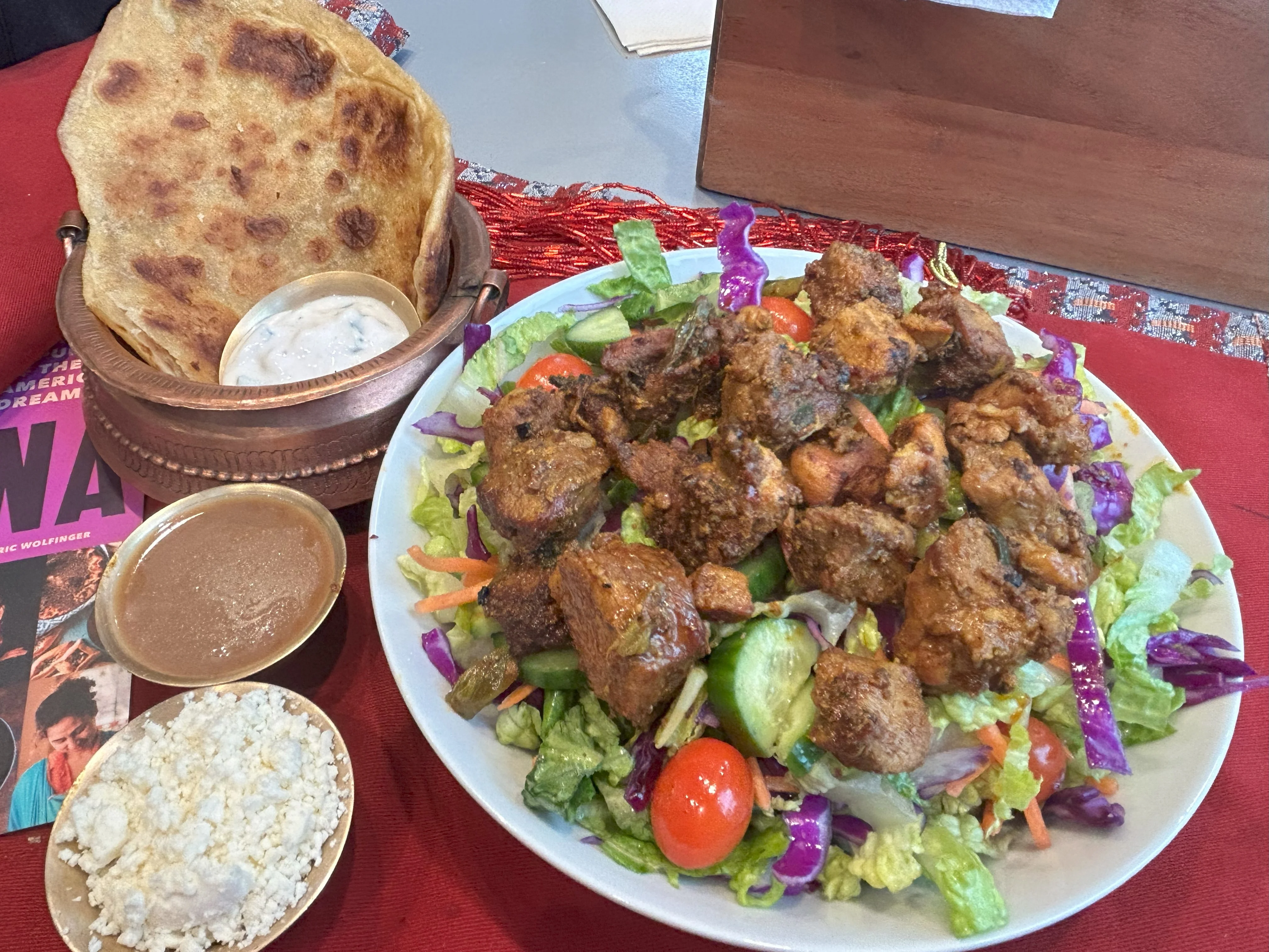 Pork Choila Entree Salad with Roti and Raita.
