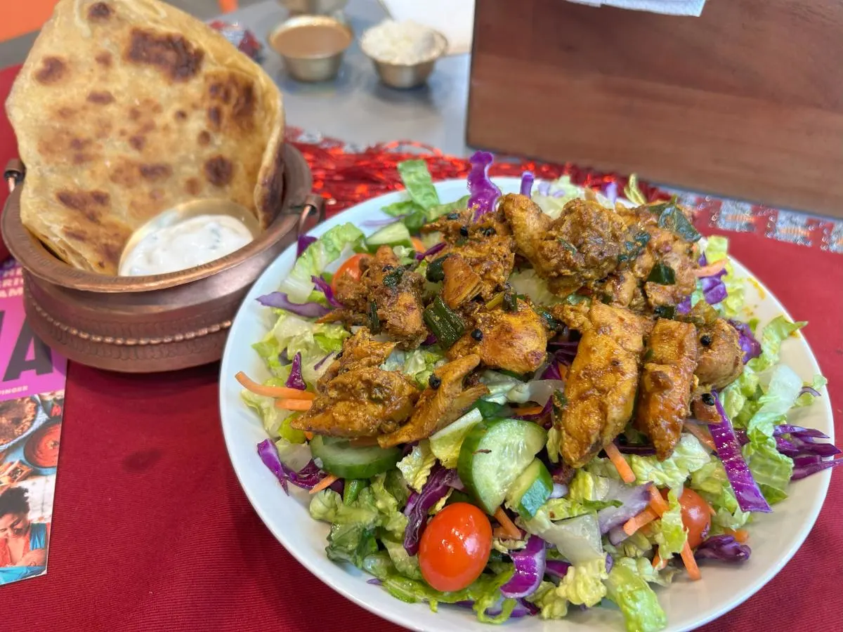 Chicken Choila Entree Salad with Roti and Raita.