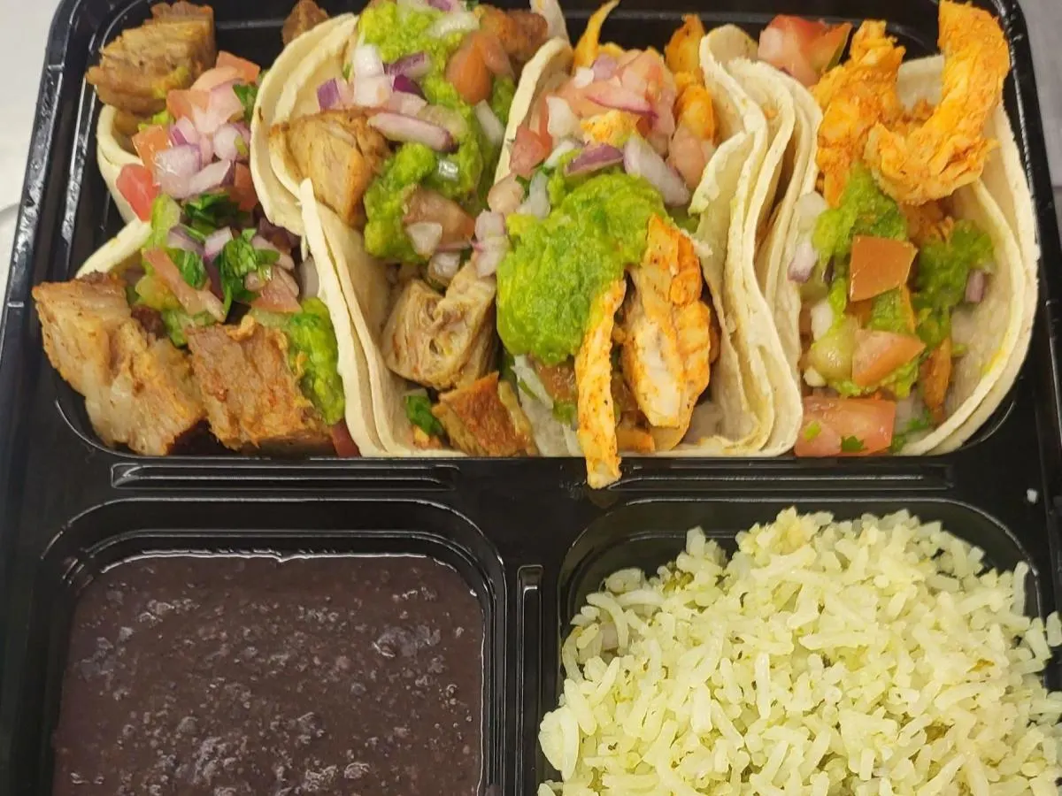 Dual Protein - Roasted Pork and Chicken Tacos w/rice & black beans Dual Protein - Roasted Pork and Chicken Tacos w/rice & black beans