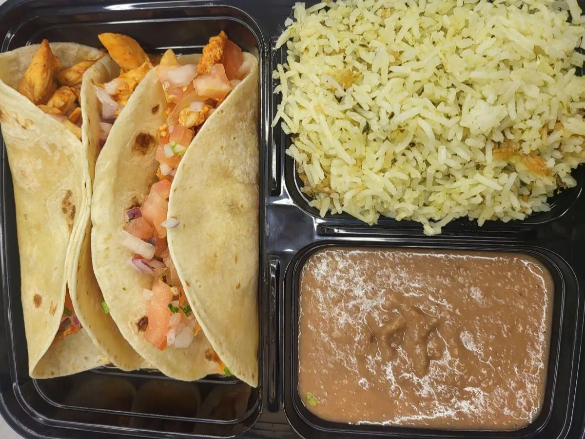 Chicken Tinga Corn Tortilla Tacos with Poblano Rice and Pinto Beans Chicken Tinga Corn Tortilla Tacos with Poblano Rice and Pinto Beans
