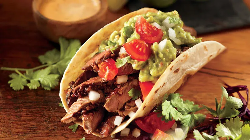Carne Asada Super Tacos with Refried Beans, Rice and Salsa