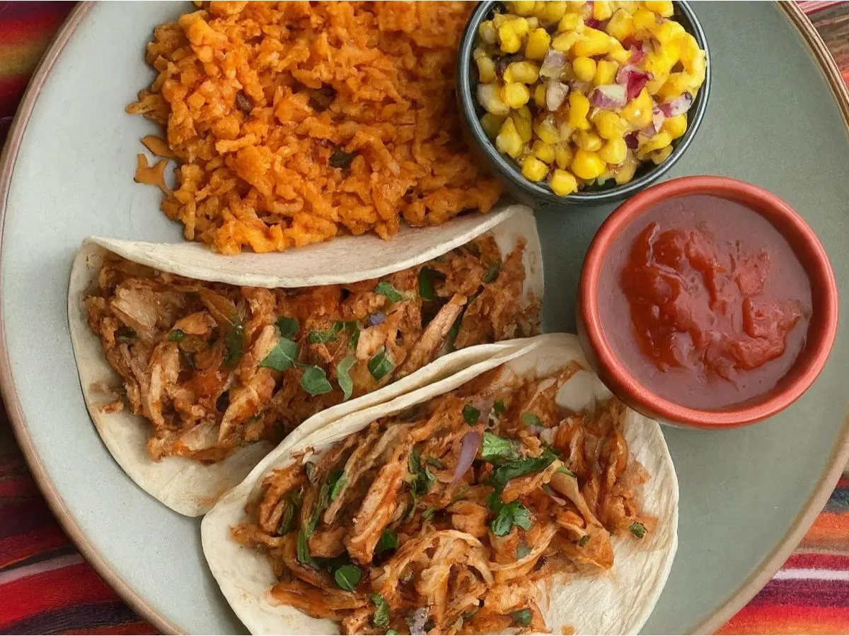 3 Smoked Pulled Chicken Corn Tortilla Tacos with Mexican Rice, Spicy Corn Salsa, and Red Chili Sauce 3 Smoked Pulled Chicken Corn Tortilla Tacos with Mexican Rice, Spicy Corn Salsa, and Red Chili Sauce