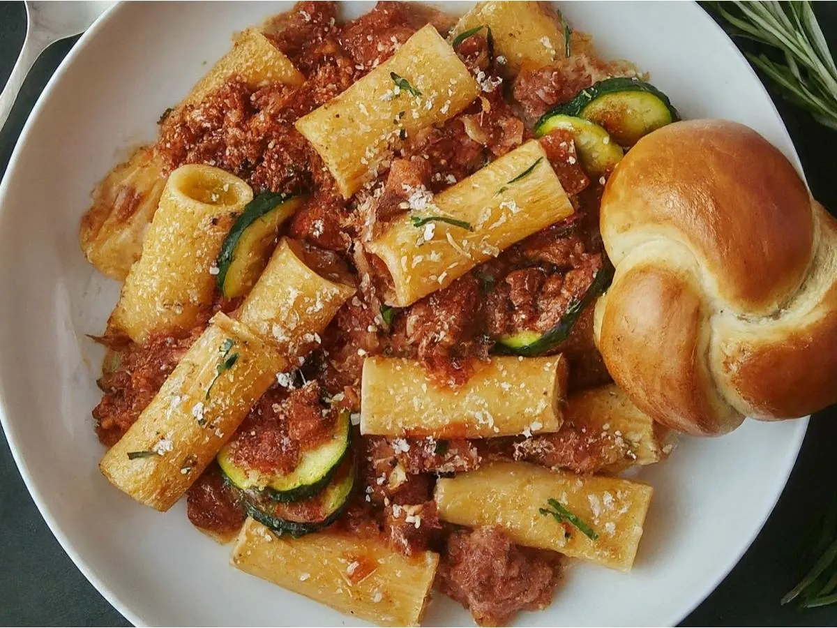 Rigatoni Bolognese With Rosemary Zucchini and a Garlic Knot Rigatoni Bolognese With Rosemary Zucchini and a Garlic Knot