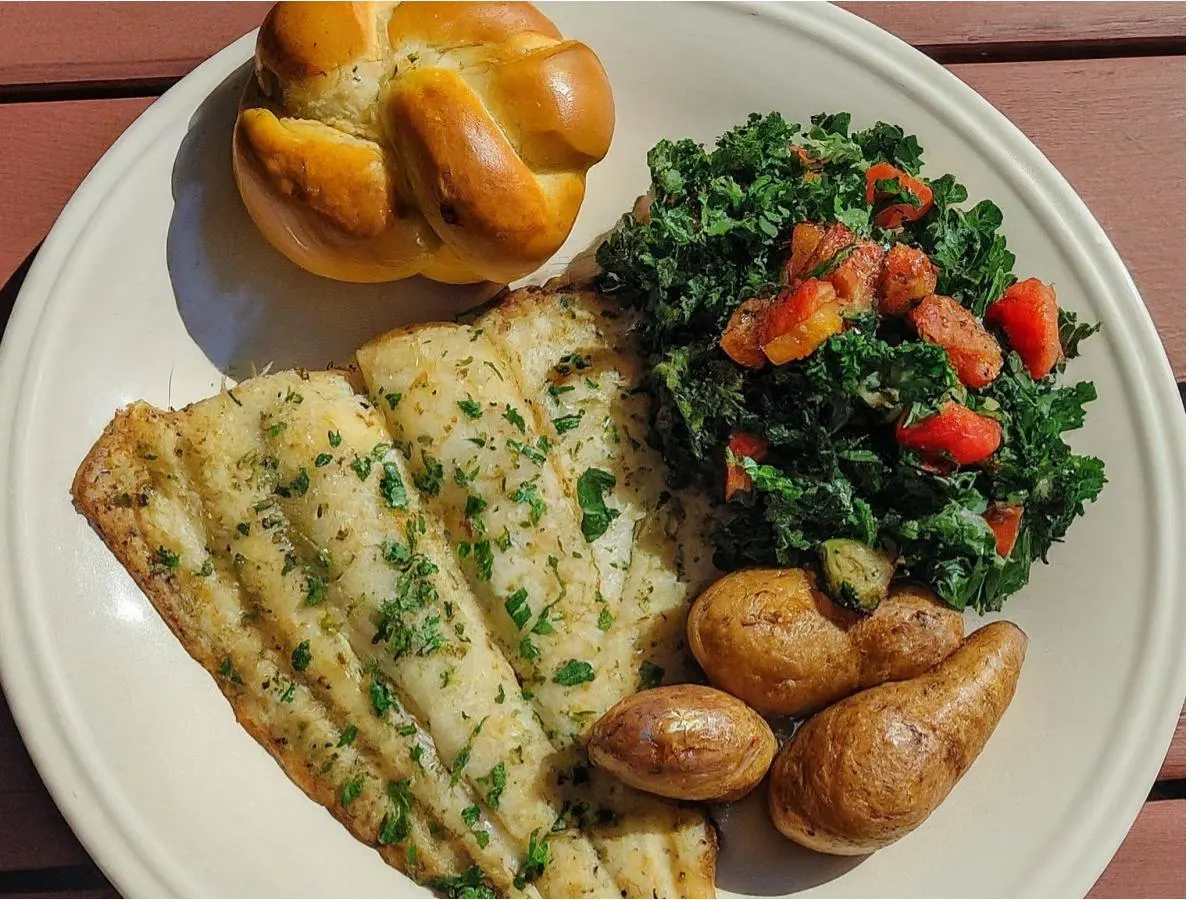 Roasted Flounder With Fingerling Potatoes, Kale Salad and a Garlic Knot Roasted Flounder With Fingerling Potatoes, Kale Salad and a Garlic Knot