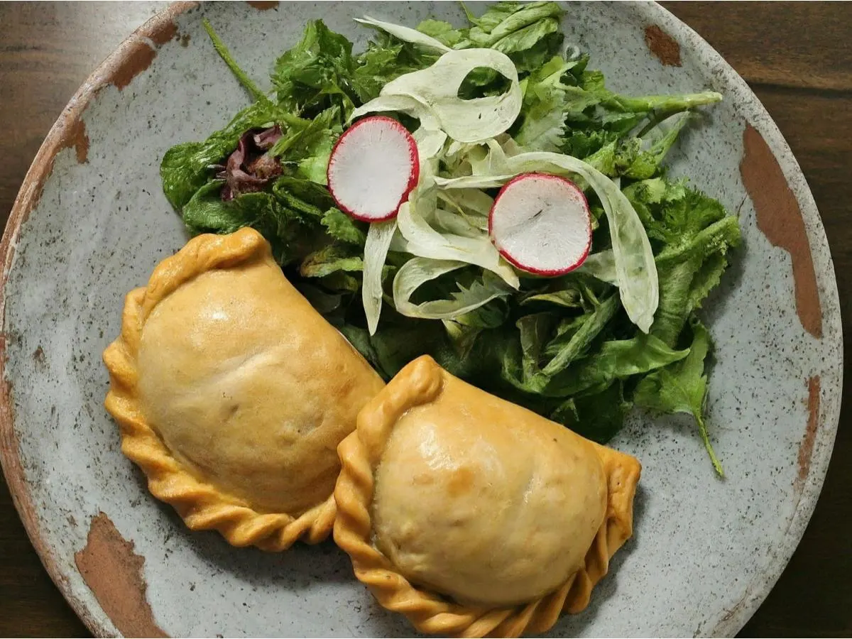 Two Vegan Champinones Empanadas with Mixed Green Salad Two Vegan Champinones Empanadas with Mixed Green Salad