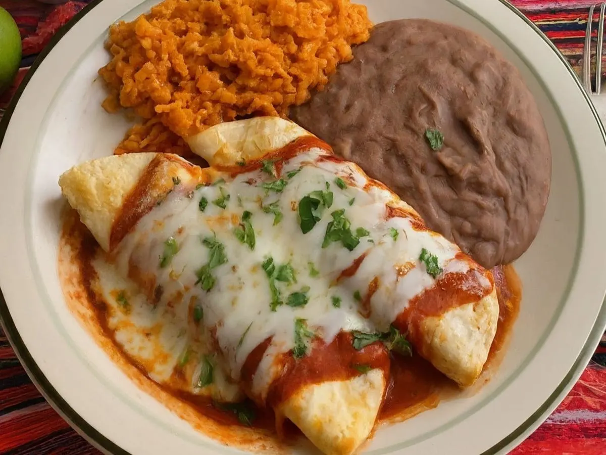 Pollo Asado Enchiladas with Refried Beans and Mexican Rice