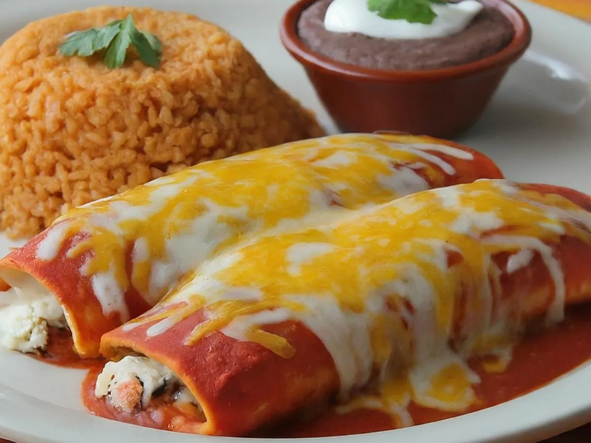 Vegetarian Impossible Enchiladas with Refried Beans and Mexican Rice