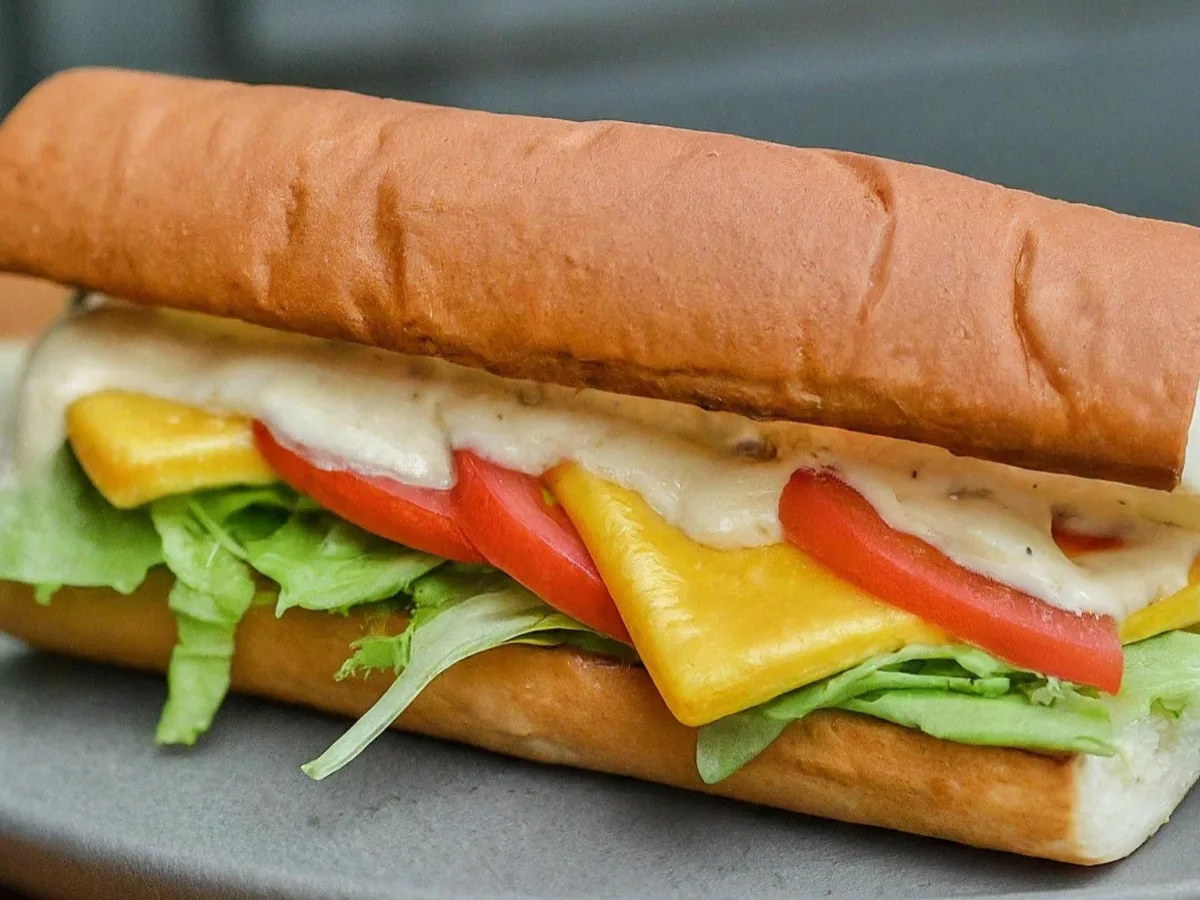 Chester the Cheetah Sandwich on a Whole Wheat Roll With Fruit Salad Chester the Cheetah Sandwich on a Whole Wheat Roll With Fruit Salad