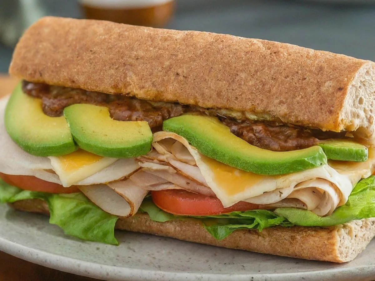 Bill Walsh Sandwich on a Whole Wheat Roll With Fruit Salad Bill Walsh Sandwich on a Whole Wheat Roll With Fruit Salad