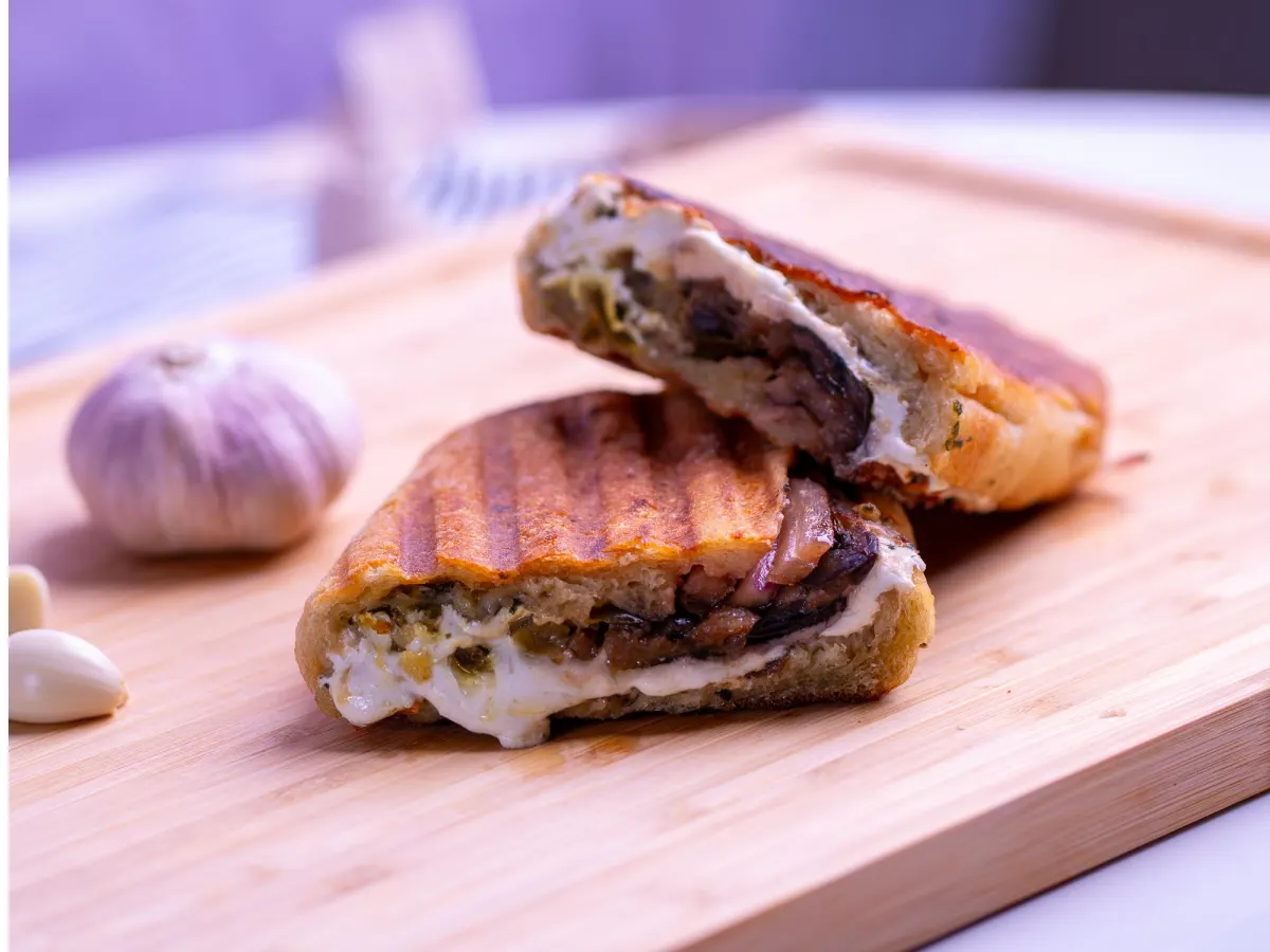 Half Spicy Eggplant Pesto Panini with a Garden Salad