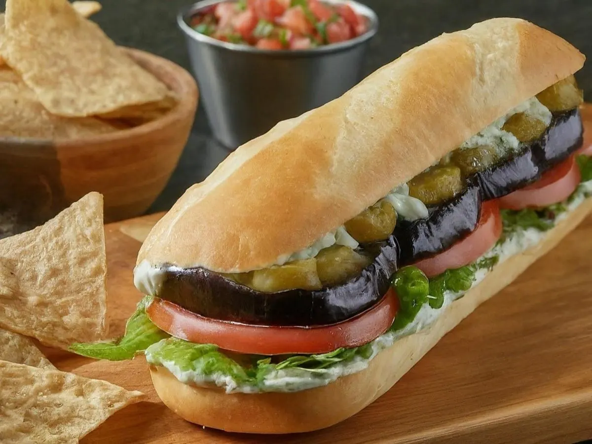 Eggplant Persian Style Sandwich a Side of Chips and Salsa Eggplant Persian Style Sandwich a Side of Chips and Salsa
