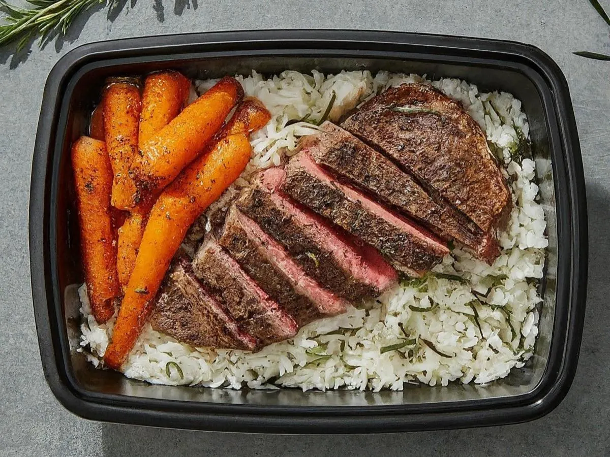 Rosemary NY Strip Steak Served with Rosemary Jasmine Rice & Roasted Carrots Rosemary NY Strip Steak Served with Rosemary Jasmine Rice & Roasted Carrots