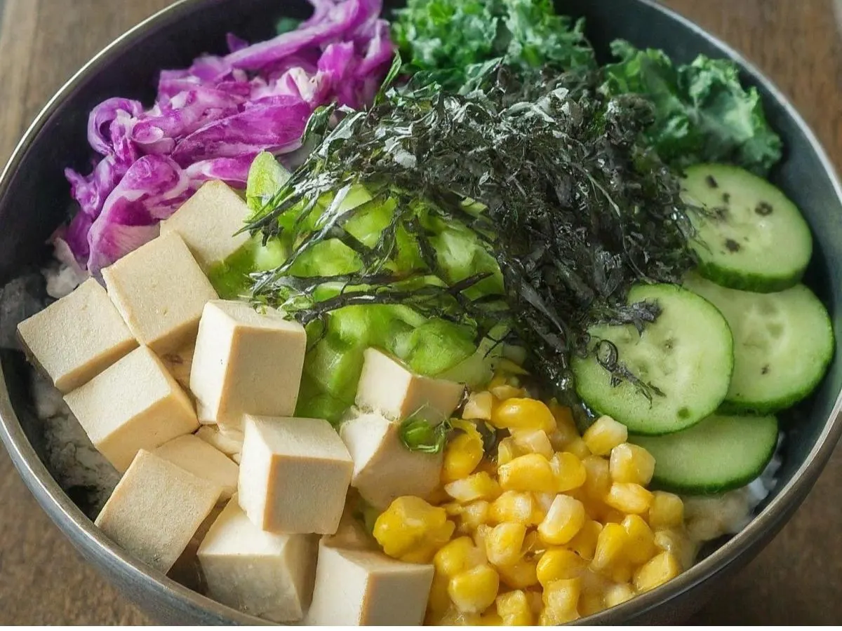 Large Organic Tofu over White Rice with Cucumber, Cabbage, Raw Kale, Sweet Corn, Green onion, Soft Tofu, and Shredded Nori