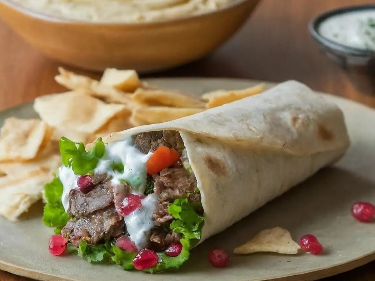 Lamb Kebab Wrap Lunch with Pita Chips, Hummus, and a Sugar Cookie