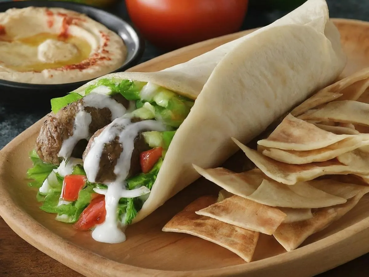 Kofte Kebab Wrap Lunch with Pita Chips, Hummus, and a Chocolate Chip Cookie
