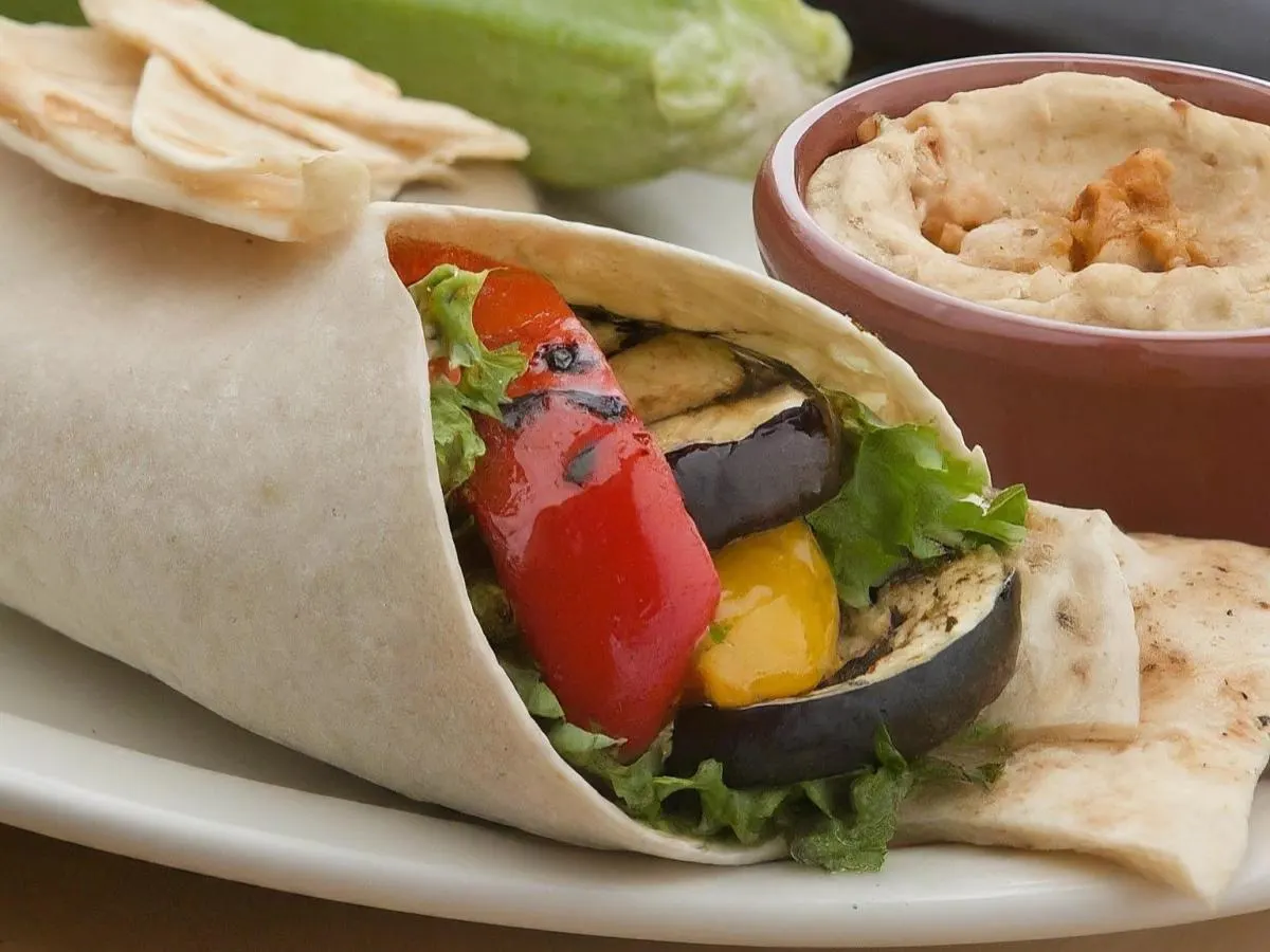Veggie Kebab Wrap Lunch with Pita Chips, Hummus, and a Green Apple