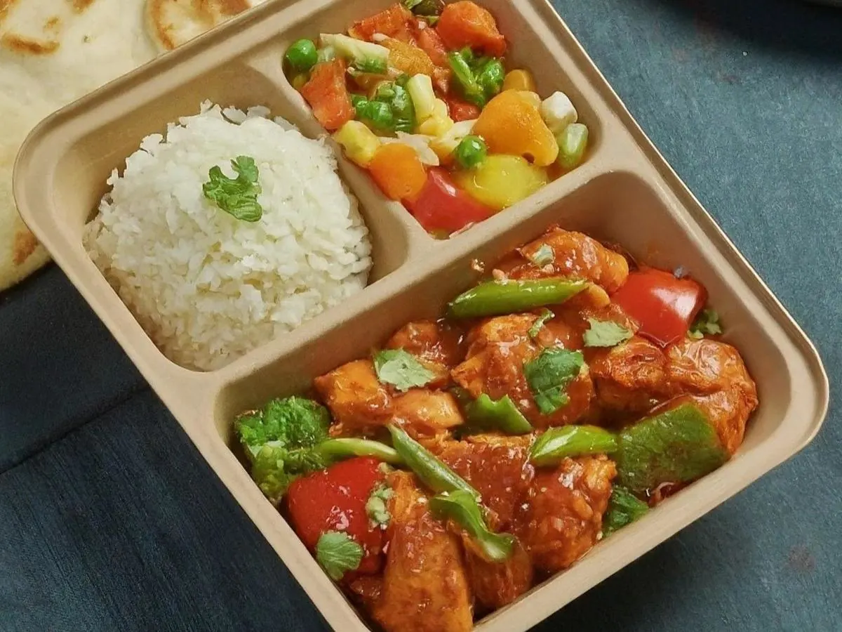 Chilli Chicken With Basmati Rice, Mixed Vegetables, and Onion Kulcha Chilli Chicken With Basmati Rice, Mixed Vegetables, and Onion Kulcha