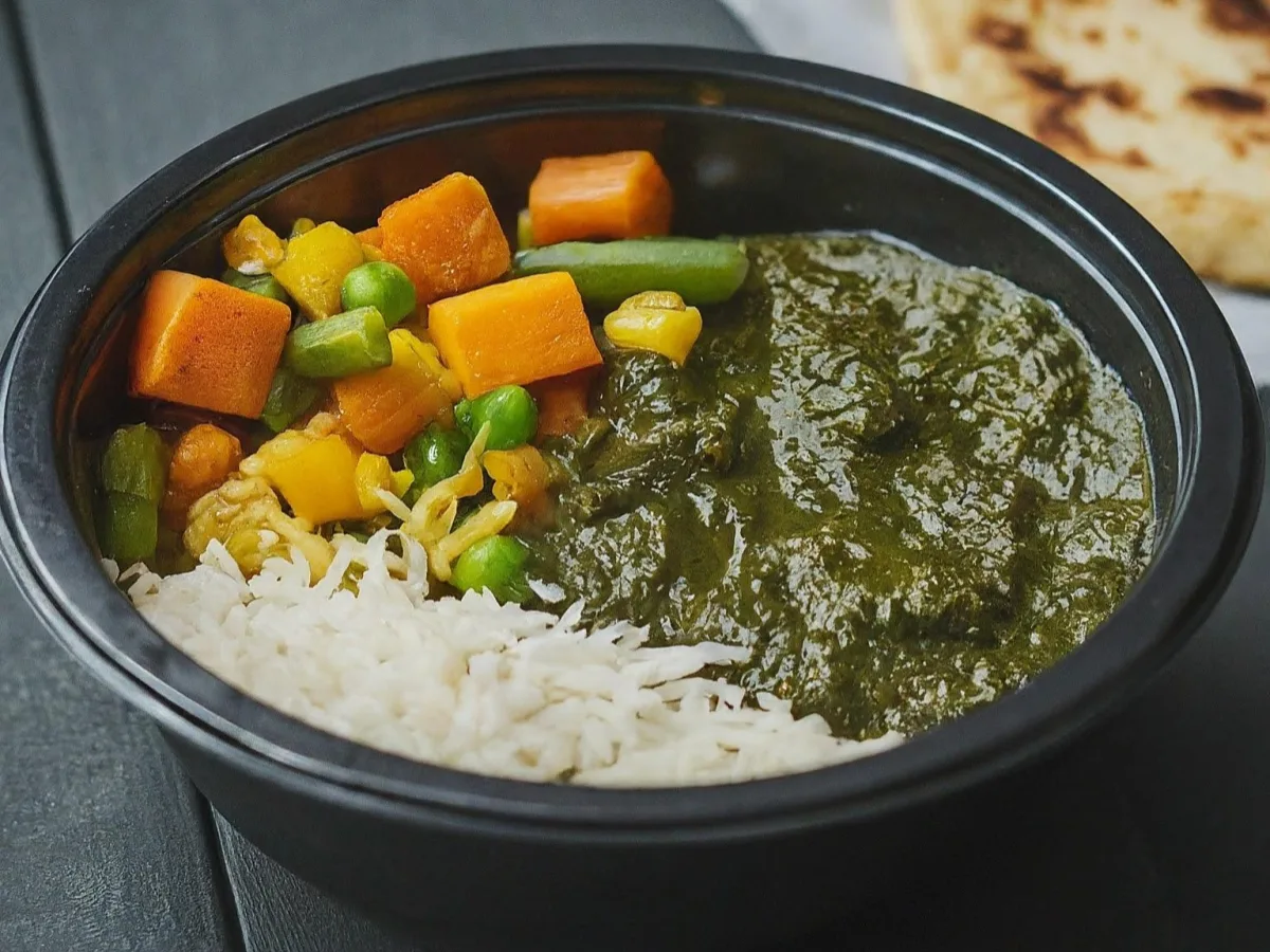 Lamb Saag With Basmati Rice, Mixed Vegetables, and Onion Kulcha Lamb Saag With Basmati Rice, Mixed Vegetables, and Onion Kulcha