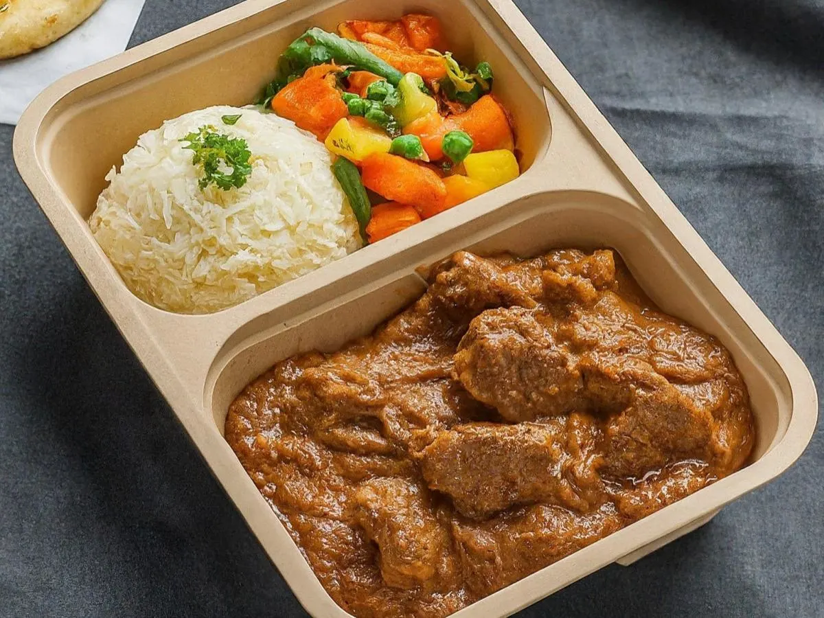 Lamb Rogan Josh With Basmati Rice, Mixed Vegetables, and Garlic Naan Lamb Rogan Josh With Basmati Rice, Mixed Vegetables, and Garlic Naan